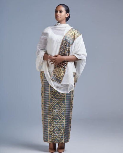 A Masterpiece of Traditional Elegance: Shimena Habesha Dress with Intricate Pattern and Tibeb Design, Habesha dress, Habesha kemis, ሀበሻ