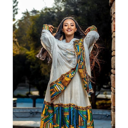 Timeless Elegance: A Shimena Habesha Dress with Wide Tilf Design and Menen Fabric, Habesha dress, Habesha kemis, Eritrean dress, Kemis, ሀበሻ