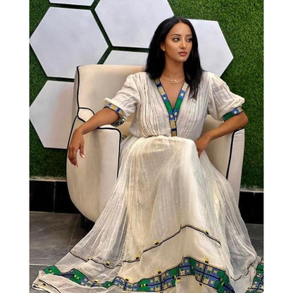 Modern Elegance: A Handwoven Shimena and Menen Fabric Habesha Dress with Exquisite Tilf Embroidery, Habesha Kemis, Eritrean dress, ሀበሻ