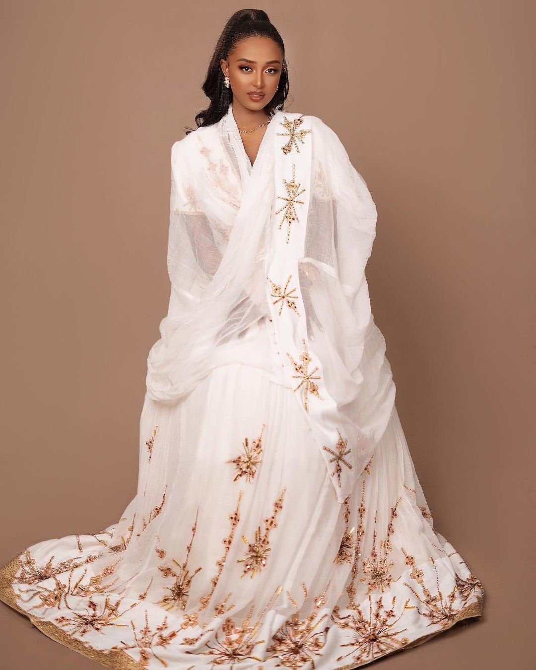 A Habesha Dress of Menen Fabric, Shimena Bottom, and White and Golden Tilf Design with Beadwork, Habesha Kemis, Eritrean dress, ሀበሻ