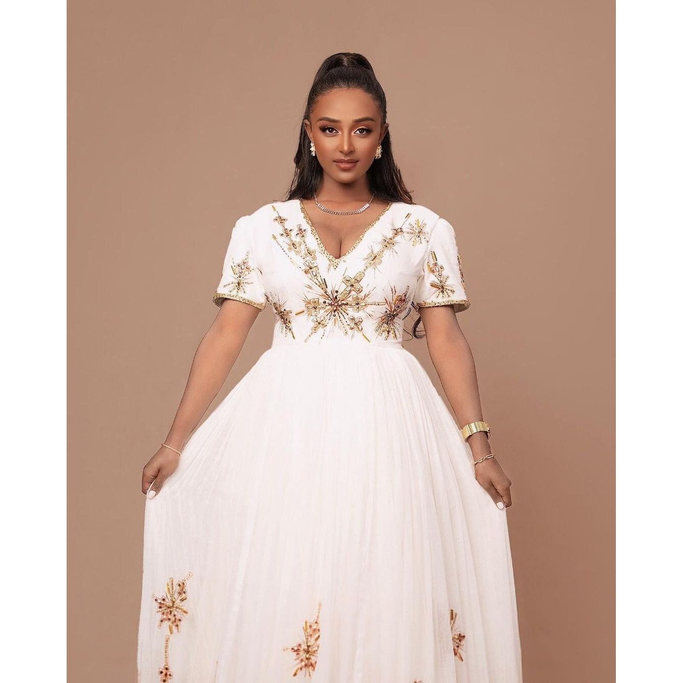 A Habesha Dress of Menen Fabric, Shimena Bottom, and White and Golden Tilf Design with Beadwork, Habesha Kemis, Eritrean dress, ሀበሻ