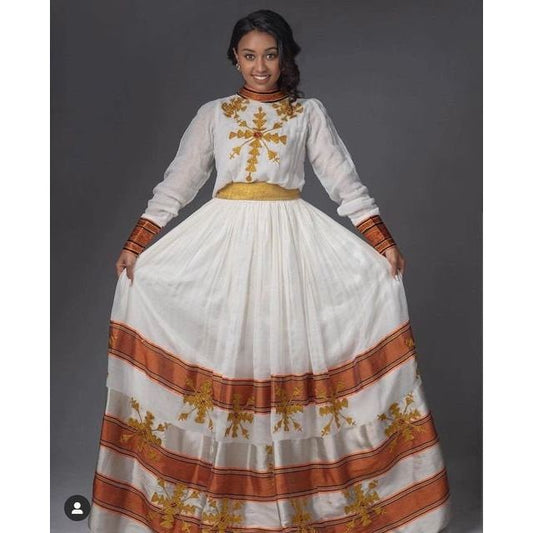 A Menen Fabric Habesha Kemis with Brown and Yellow Tilf: Shimena