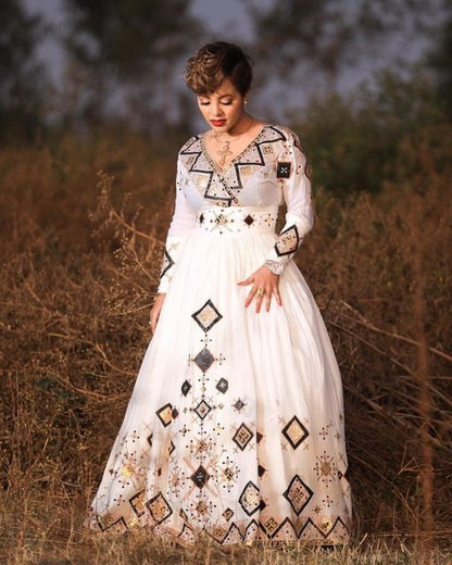 Luxurious Menen: A Stunning Ethiopian Tilf Habesha Dress