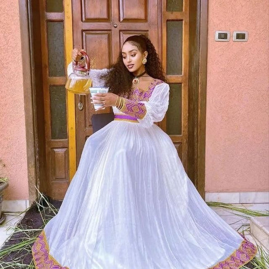 A Luxurious Menen Fabric Habesha Dress with a Contemporary Twist