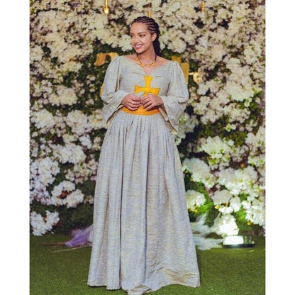 Handmade Elegance: A Stunning Ethiopian Dress with Yellow Cross Tilf
