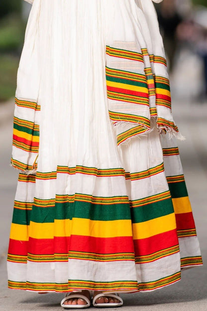 A Stunning Shimena Habesha Dress with Menen Fabric and Flag-Inspired Design, Habesha dress, Habesha kemis, Eritrean dress, Kemis, ሀበሻ