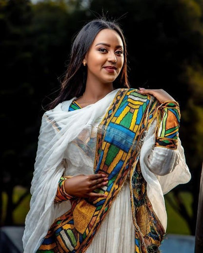 Timeless Elegance: A Shimena Habesha Dress with Wide Tilf Design and Menen Fabric, Habesha dress, Habesha kemis, Eritrean dress, Kemis, ሀበሻ