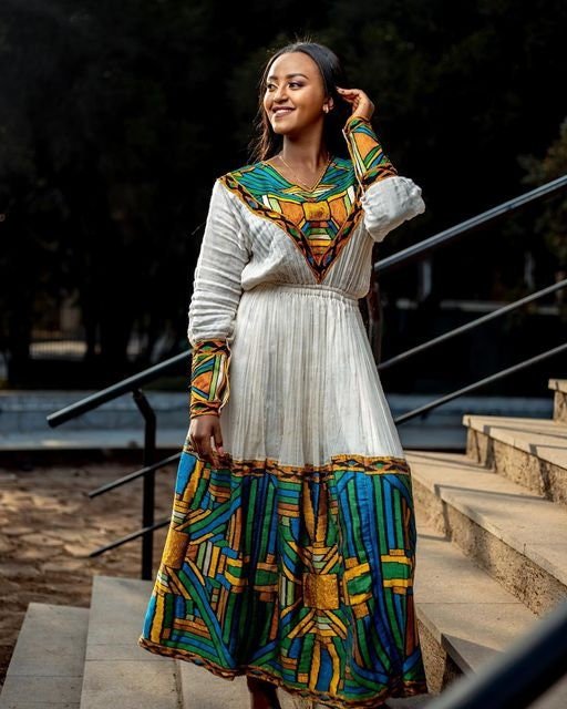 Timeless Elegance: A Shimena Habesha Dress with Wide Tilf Design and Menen Fabric, Habesha dress, Habesha kemis, Eritrean dress, Kemis, ሀበሻ