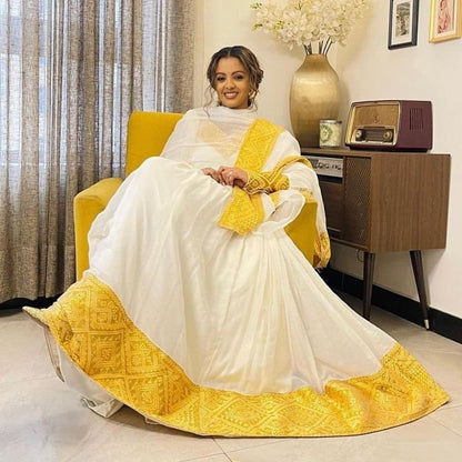 Golden Sun: A Handwoven Shimena Habesha Dress with Stunning Yellow Tilf Embroidery, Habesha Kemis, Eritrean dress, ሀበሻ