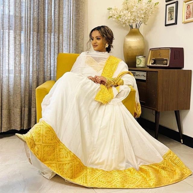 Golden Sun: A Handwoven Shimena Habesha Dress with Stunning Yellow Tilf Embroidery, Habesha Kemis, Eritrean dress, ሀበሻ