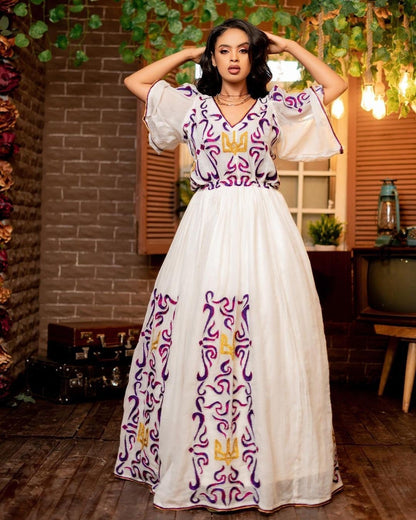 Purple pattern habesha dress beautiful tilf habesha kemis design