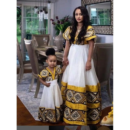 Majestic Menen Kemis with Vibrant Tilf and Shimena Design, Habesha Kemis, Eritrean dress, ሀበሻ