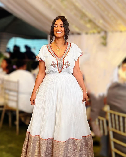 A Beautiful Habesha Clothing with Menen Fabric, Simple Modern Shimena Dress, and Intricate Tilf Designs, habesha libs, habesha kemis