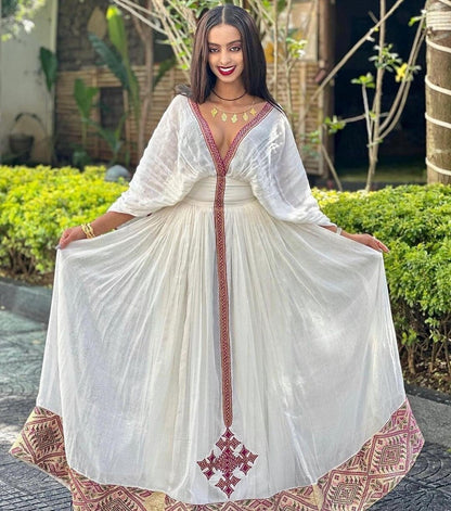 Simple habesha dress with thin tilf hand woven Ethiopian dress design