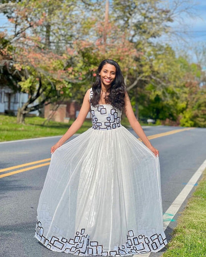 Timeless Simplicity in Habesha Dress Ethiopian Dress with Square Box-Like Patterns