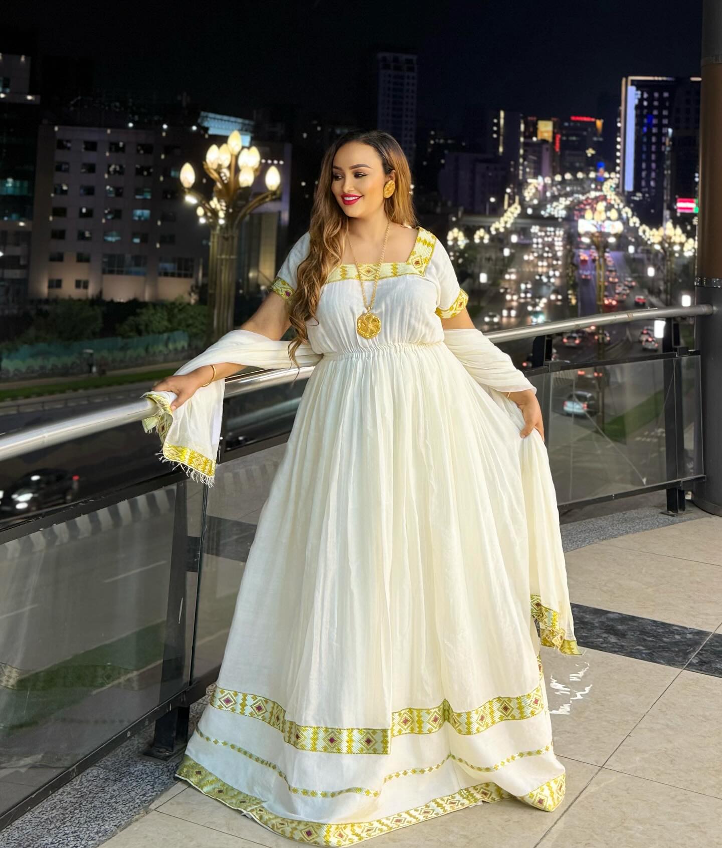 Elegant Habesha Kemis – White Ethiopian Dress with Yellow Tibeb Design