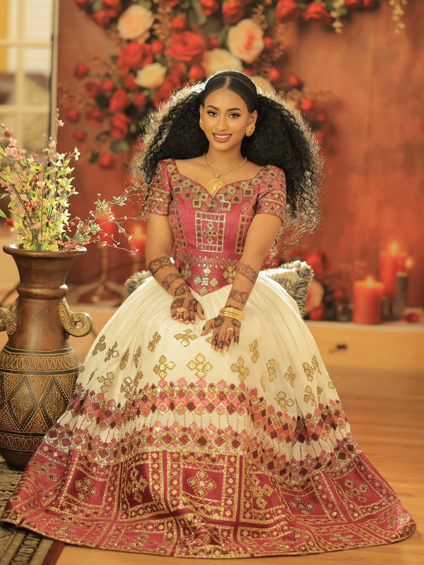  red and gold embroidered traditional ethiopian wedding dress