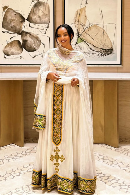 elegant Habesha cloth Ethiopian dress with green and gold embroidery