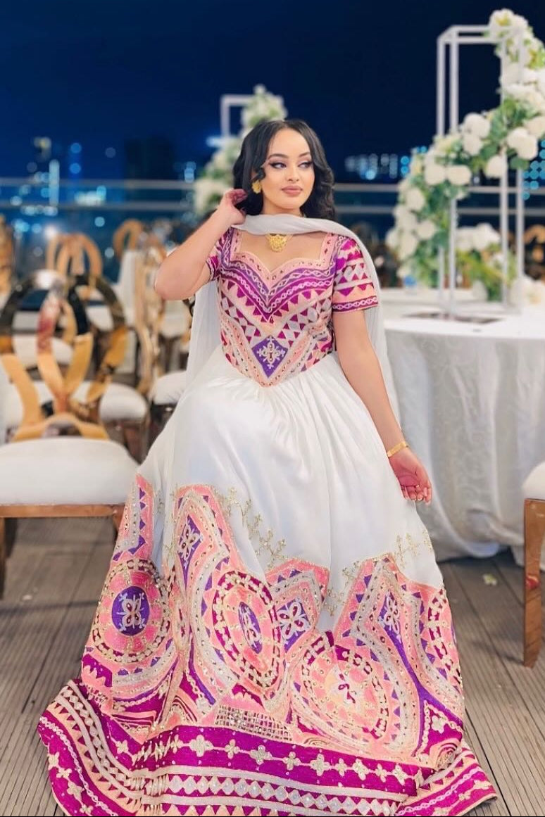 Luxurious Ethiopian Dress with Ornate Embroidery A Regal Traditional Ethiopian Wedding Dress Inspired by Timeless Cultural Elegance