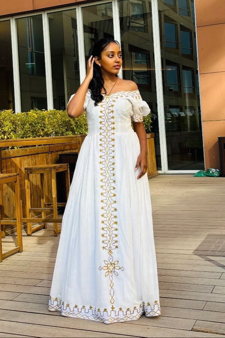 White Off-Shoulder Habesha Kemis with Golden Details