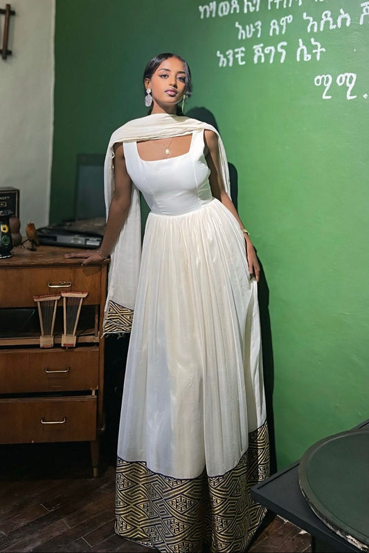 Handwoven Sleeveless Habesha Dress with Elegant Traditional Detail