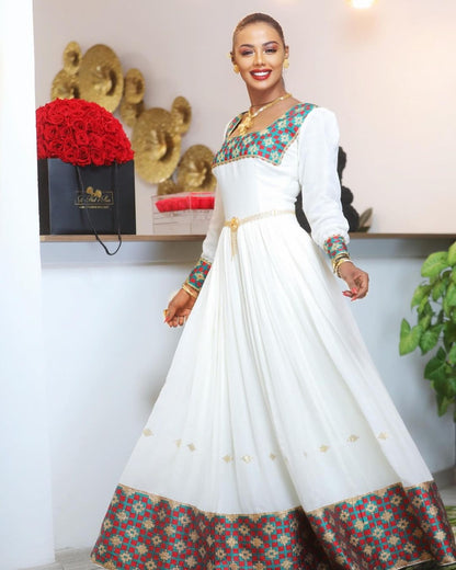 Chic Elegance: Gorgeous Habesha Dress with Exquisite Patterns in Menen Fabric and Cotton Blend