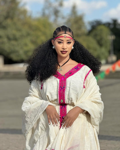 Elegance in Pink: Handwoven Fetil Fabric and Cotton Blend Habesha Kemis - A Stunning Ethiopian Dress