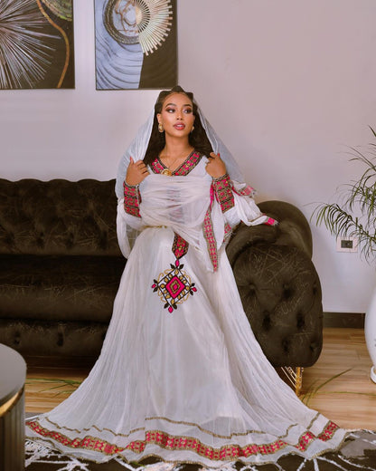 Radiant Charm: Beautiful Pink Design Habesha Dress in Menen Fabric and Cotton Splendor