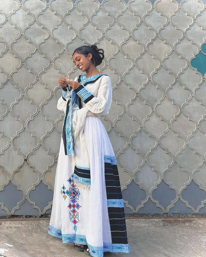 Timeless Beauty: Blue and Black Striped Handwoven Habesha Dress in Menen Fabric