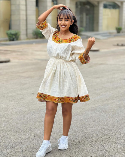 Breezy Habesha Chic: Embracing the Essence of Summer in a Short Ethiopian Kemis