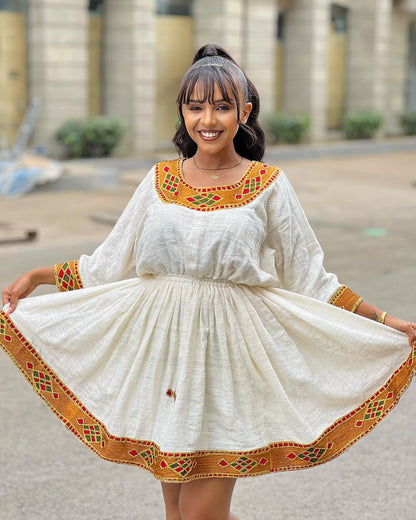 Breezy Habesha Chic: Embracing the Essence of Summer in a Short Ethiopian Kemis