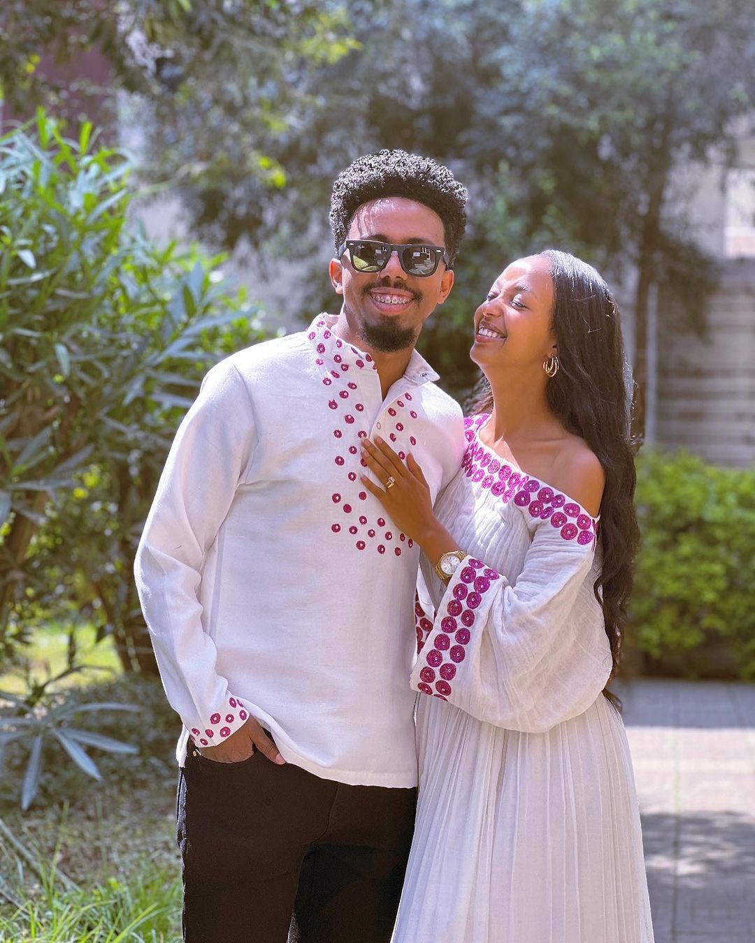 Contemporary Harmony: Beautiful Habesha Couples Outfit with Vibrant Circle Designs
