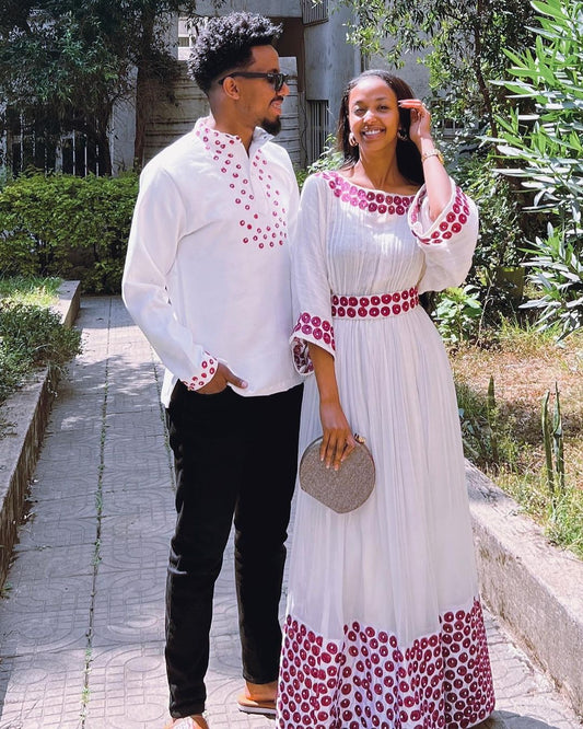 Contemporary Harmony: Beautiful Habesha Couples Outfit with Vibrant Circle Designs