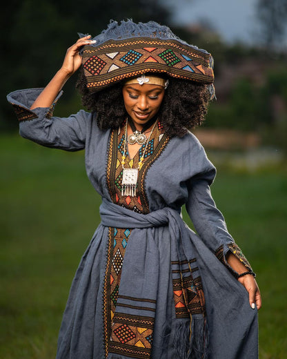 Elegance in Indigo: Exploring the Intricacies of the Habesha Kemis