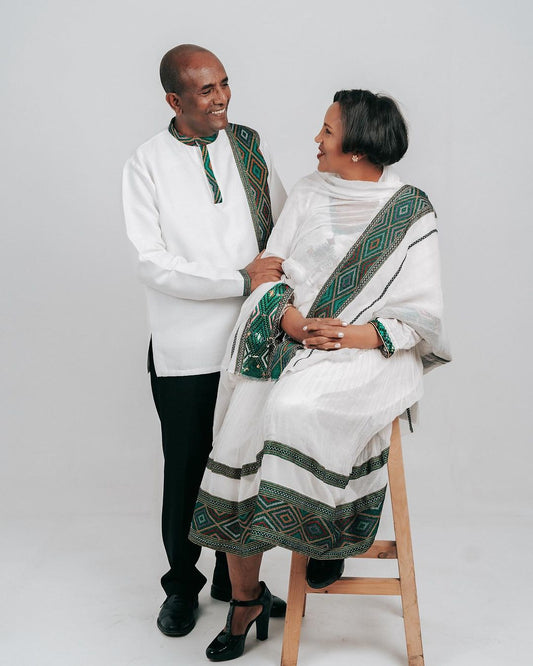 "Enchanting Habesha Wedding Attire: Ethiopian Couples' Resplendent Green-Patterned Elegance