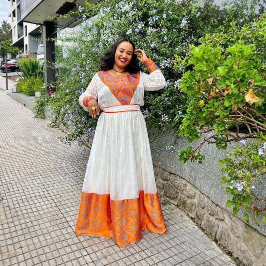 The Simplicity of Orange in the Habesha Kemis Habesha Dress Modern Ethiopian Dress Style