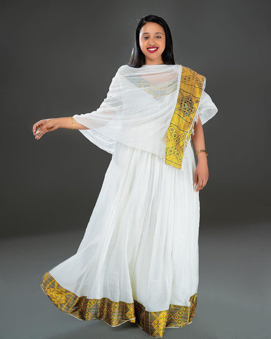 Golden Splendor Ethiopian Dress Radiant Habesha Kemis - A Tapestry of Ethiopian Beauty