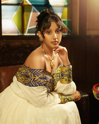 Radiant Patterns in Habesha Dress Golden Design Modern Ethiopian Dress