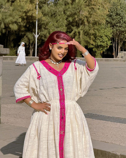 Cultural Elegance Modern Ethiopian Habesha Dress in Pink Fetil Fabric