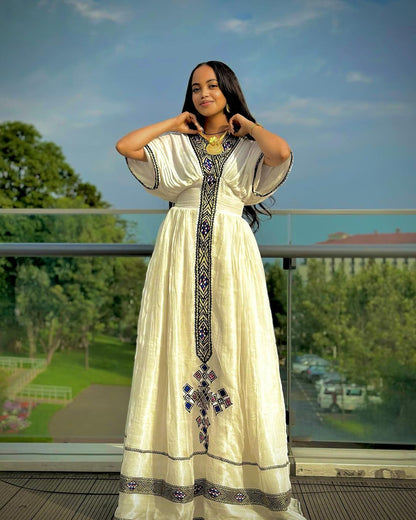 Embrace the Azure Elegance of Habesha Kemis Royal Blue Tilet Cultural Ethiopian Dress