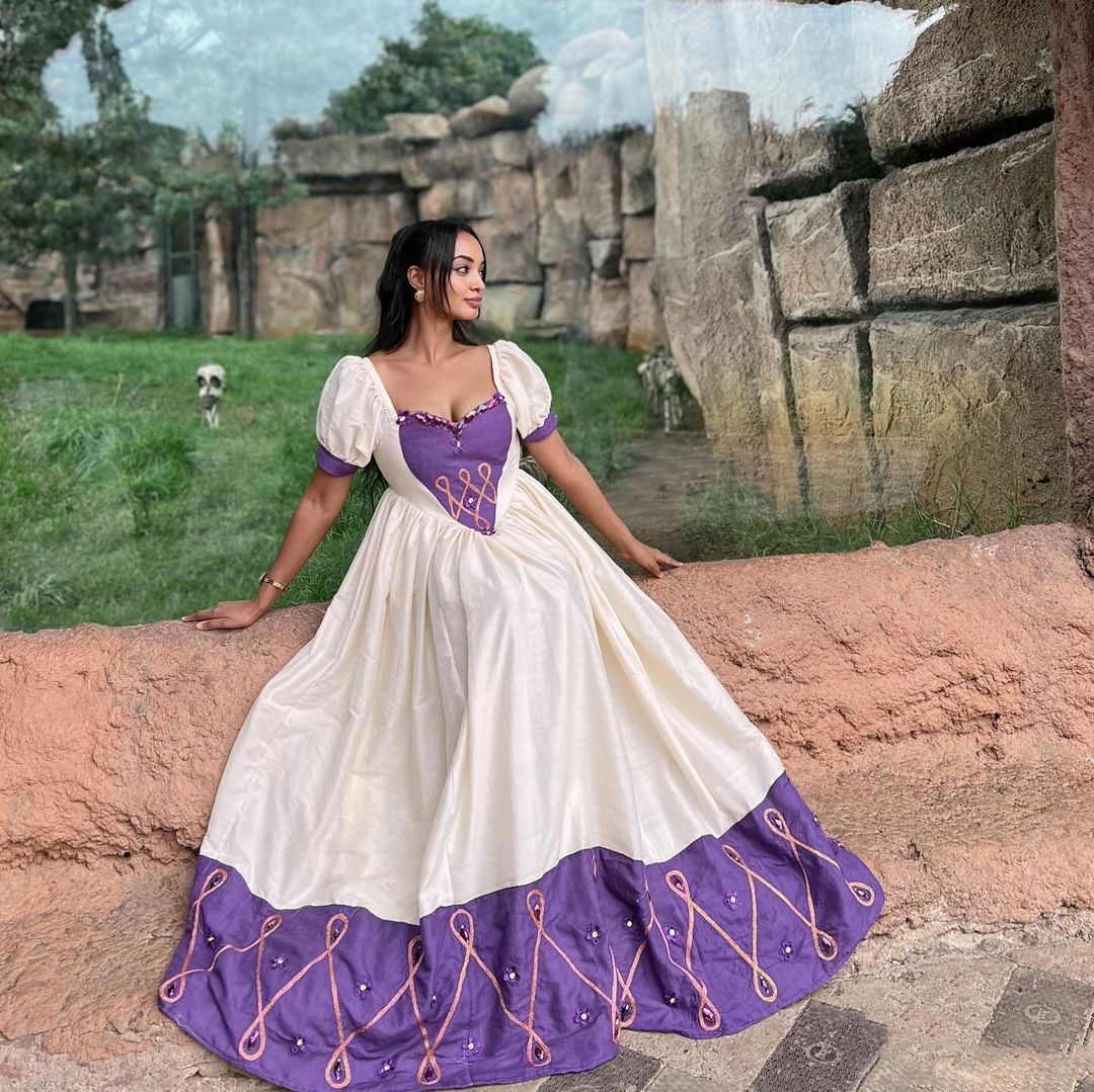 Modern Ethiopian Habesha Kemis with Purple Wide Tilet Design