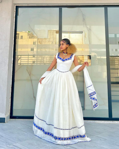 Radiate Elegance in Our Modern Habesha Dress Gorgeous Blue Ethiopian Dress