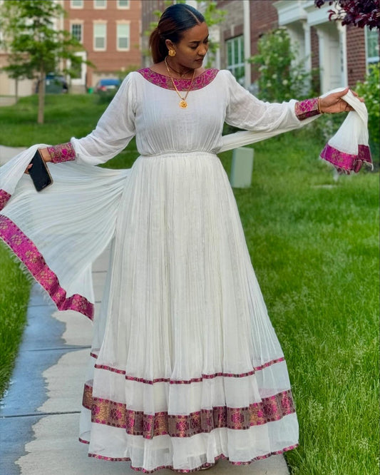 Embrace Simplicity in Ethiopian Dress Elegant Exquisite Pink Habesha Dress