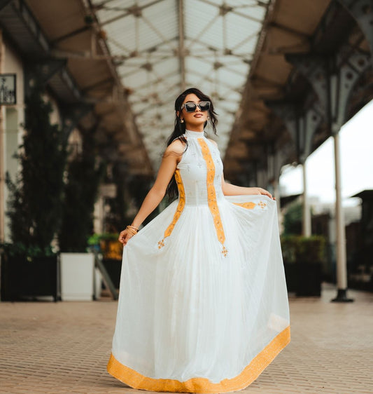 Golden-Orange Cross-Stitched Modern Habesha Dress: Relaxed Fit for Outdoors Traditional Ethiopian Dress