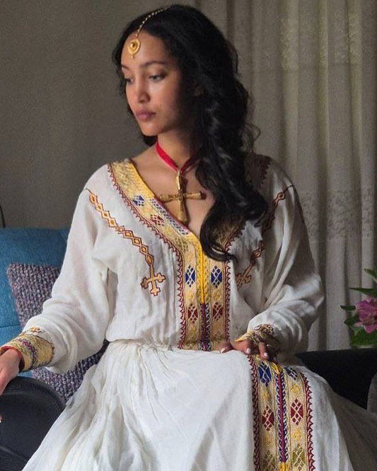 Simple Cross-Stitched Habesha Dress: with Multicolor Ornaments Traditional Ethiopian Dress