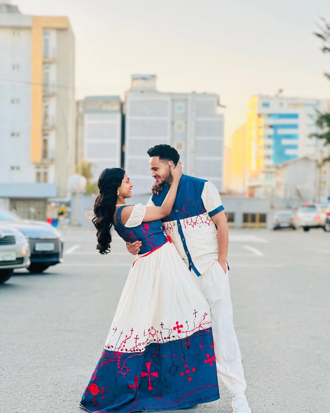 Sophisticated Red and Blue Habesha Couples Outfit: Spectacular Matching Ethiopian Couples Outfit