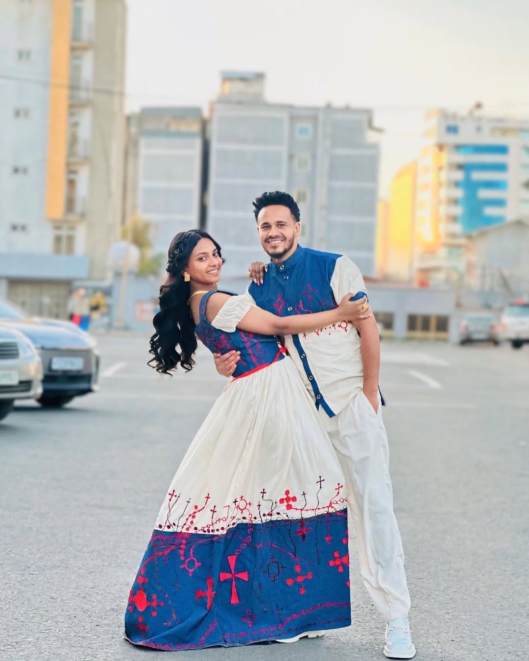 Sophisticated Red and Blue Habesha Couples Outfit: Spectacular Matching Ethiopian Couples Outfit