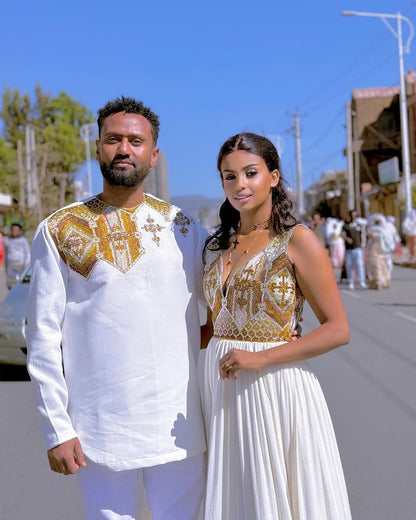 Beautiful Union in Golden Habesha Couples Outfit: Excellent Embellishment in Matching Ethiopian Couples Attire