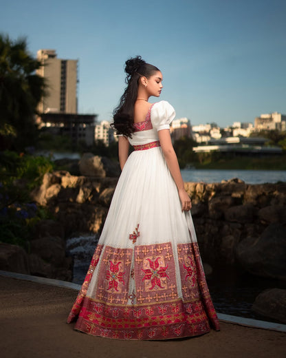 Enchanting Red Traditional Ethiopian Dress: Puffy Short Sleeves and Wide Hemline on Habesha Cloth for Special Ceremonies Ethiopian Clothing