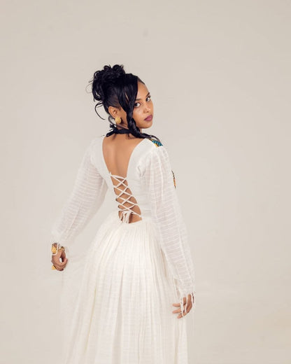 Stylish Habesha Dresses with Colorful Neck Embroidery and Ethiopian Motifs for Occasions